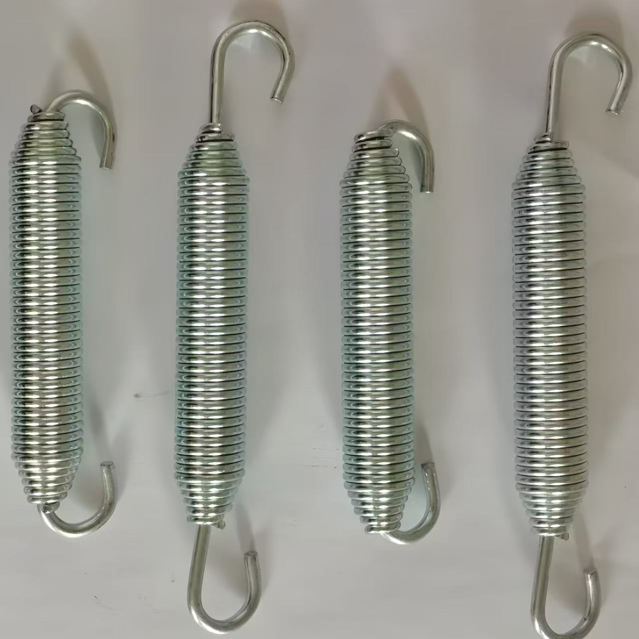 Trailer brake adjuster replacement spring with corrosion resistance